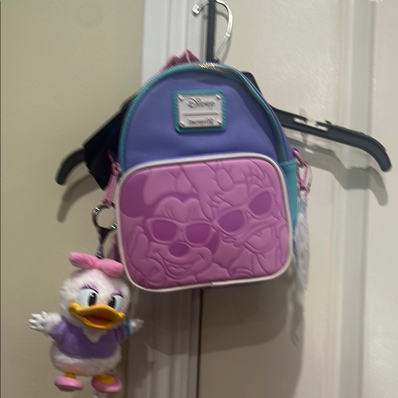 Loungefly Kids Backpack andcross-body Purple and Teal with Disneylabubu.